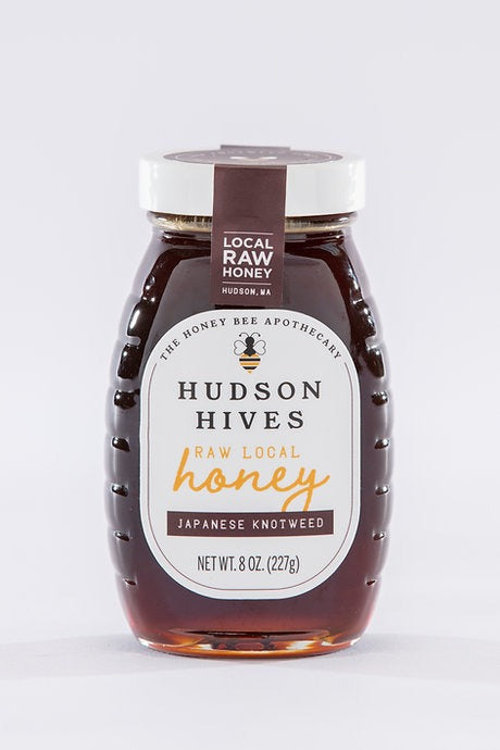 Jar of Hudson Hives honey on a white background