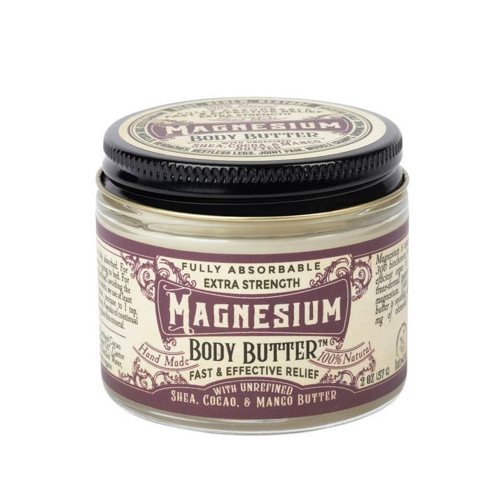 Jar of magnesium body butter with a purple label on a white background