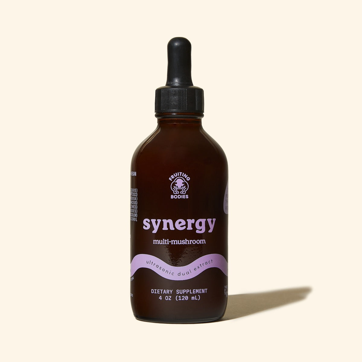 Brown bottle with black dropper labeled 'synergy' on a beige background