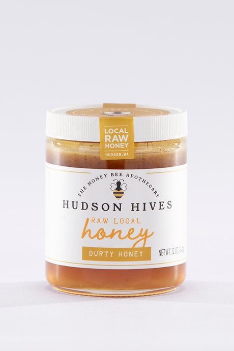 Jar of Hudson Hives honey on a white background