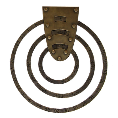 Brass colored perpetual Calendar on white background