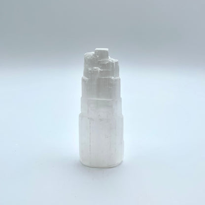 Selenite Tower in grey background