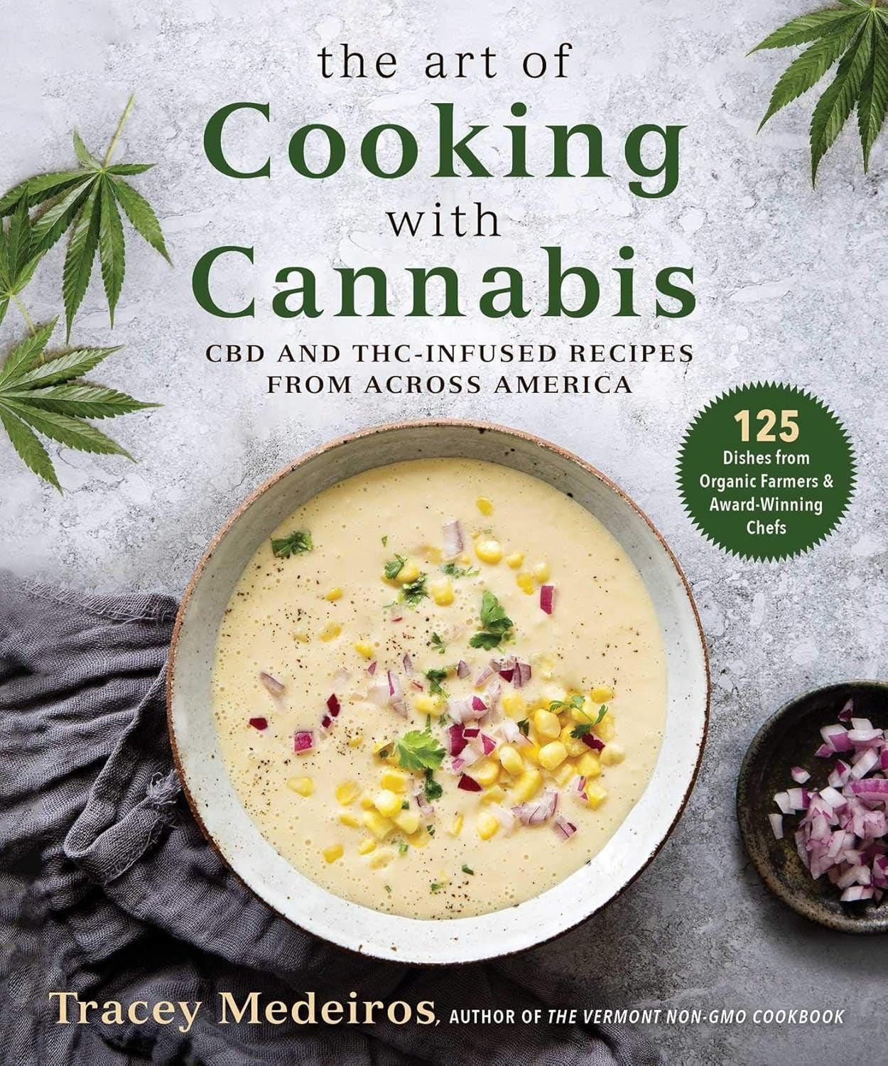 Cookbook cover of 'The Art of Cooking with Cannabis' featuring a bowl of soup and cannabis leaves.