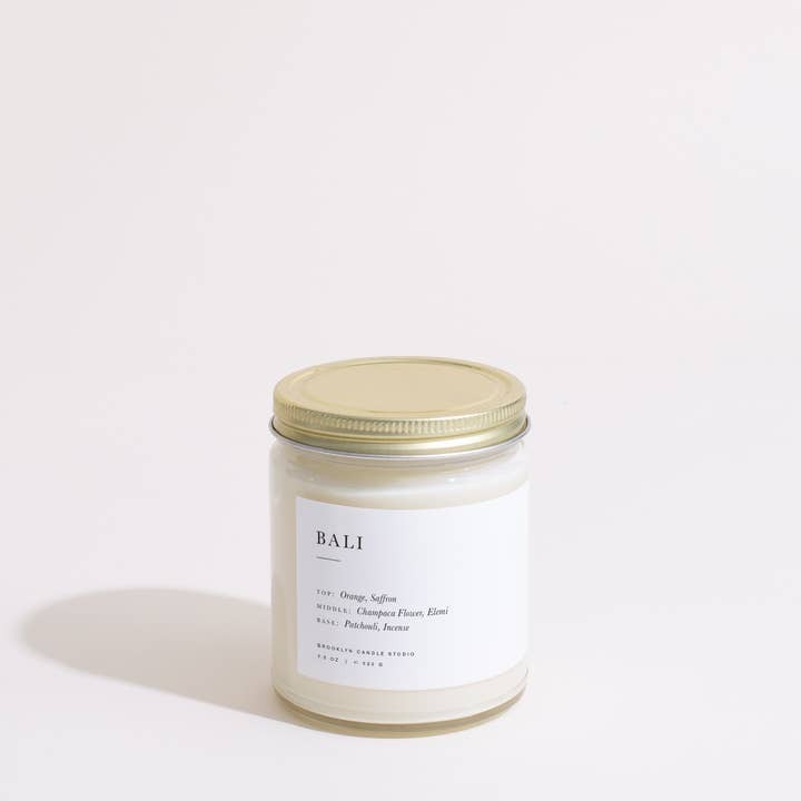 Candle jar labeled 'Bali' on a white background