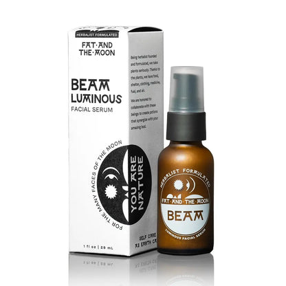 Facial serum bottle and packaging with 'Fat and the Moon' branding on a white background