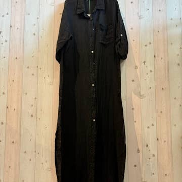 Black oversized shirt on a wooden background