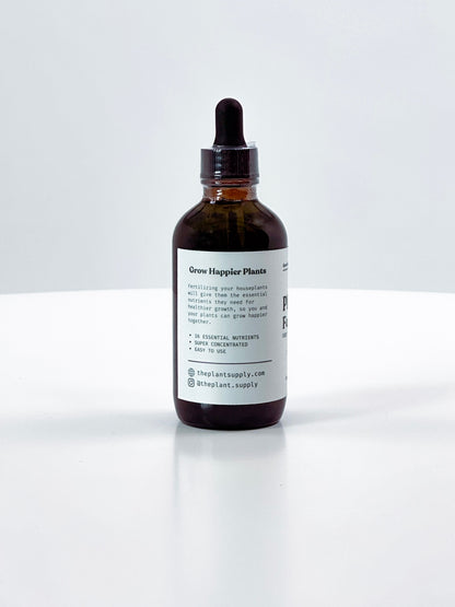 Brown glass bottle with dropper on a white background