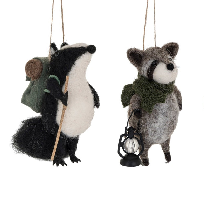 Set of two animal ornaments hanging on a white background