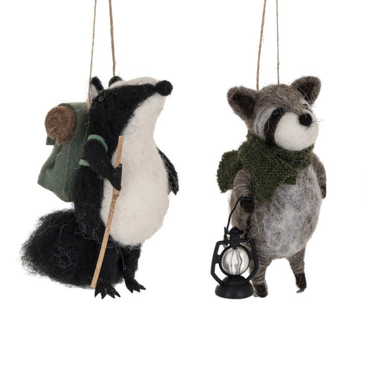 Set of two animal ornaments hanging on a white background