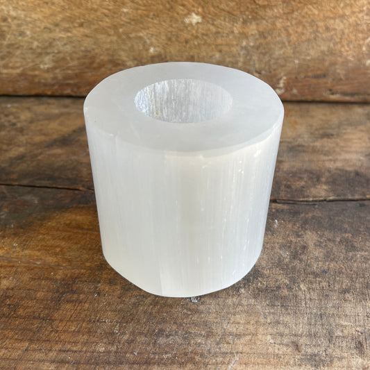 Clear crystal vase on a wooden surface