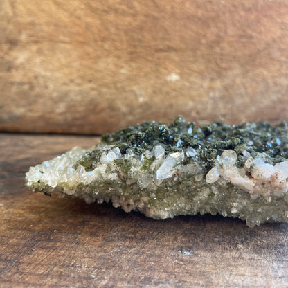 Mineral sample on a wooden surface