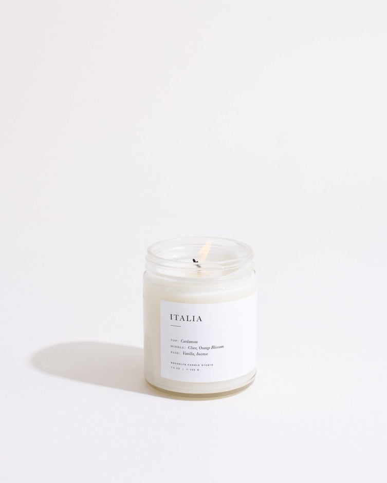 Candle labeled 'Italia' on a white background