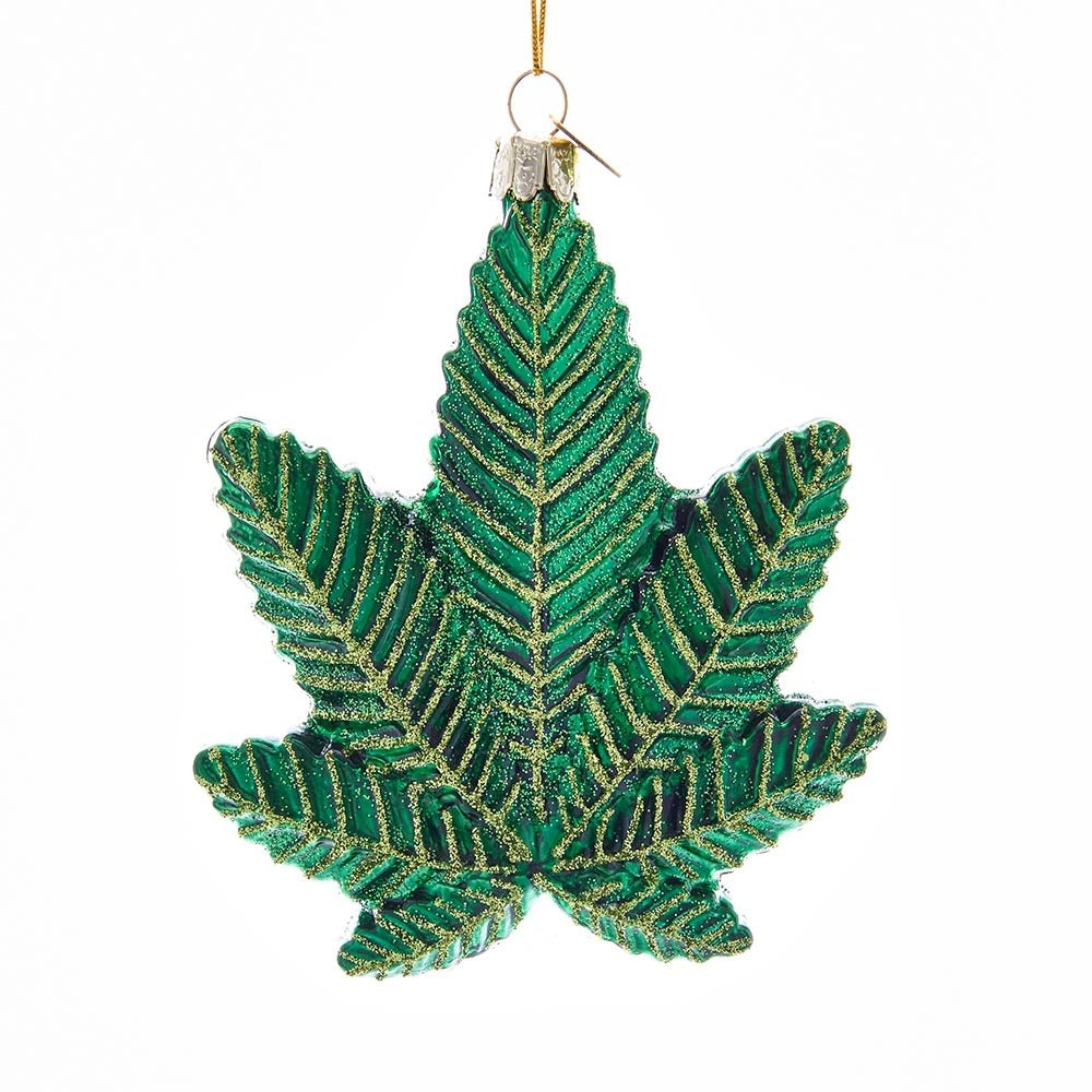 Decorative pot leaf ornament with gold accents on a white background