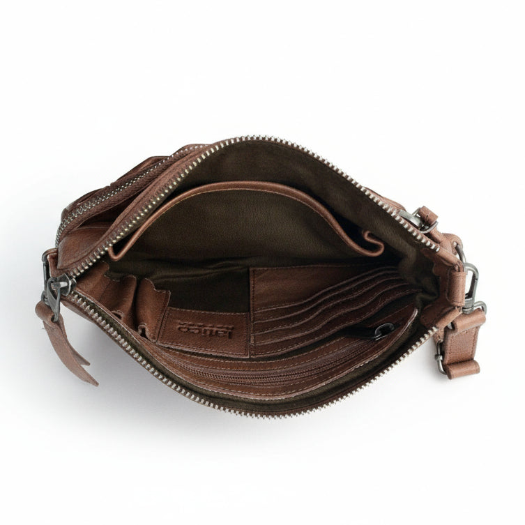 Brown leather bag with visible brand logo on a white background