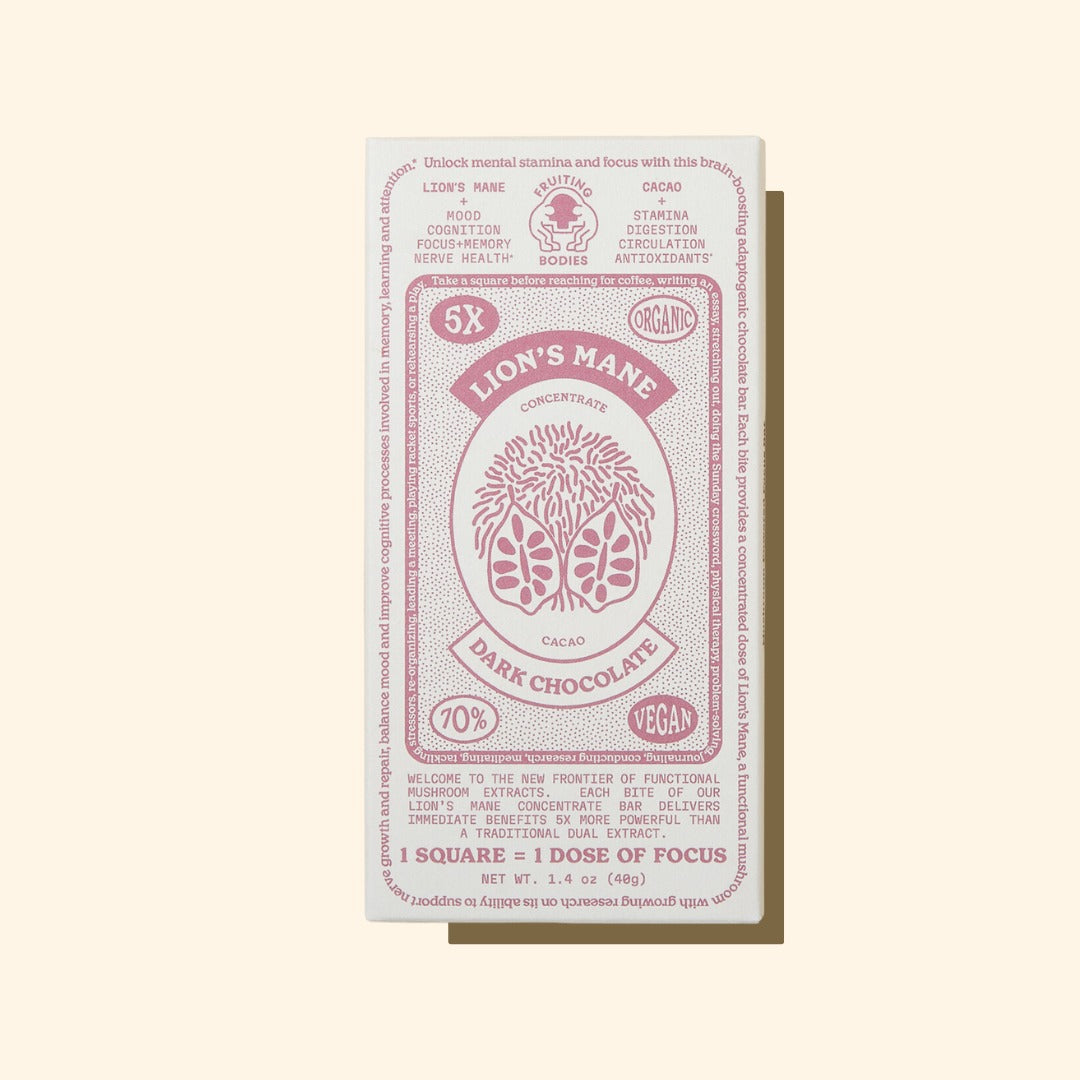 Dark chocolate bar packaging with 'Lion's Mane' branding on a light beige background