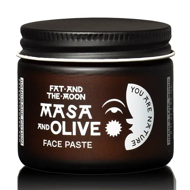 Jar of Masa and Olive Face Paste by Fat and the Moon on a white background