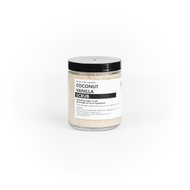 Jar of coconut vanilla scrub on a white background