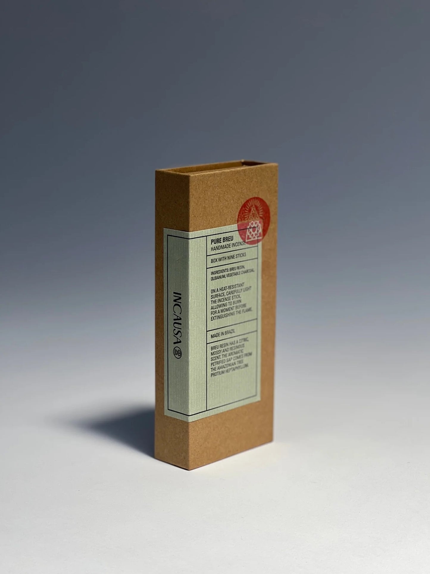 Pure Breu Incense - Rectangular cardboard box with a green label and text on a gradient background