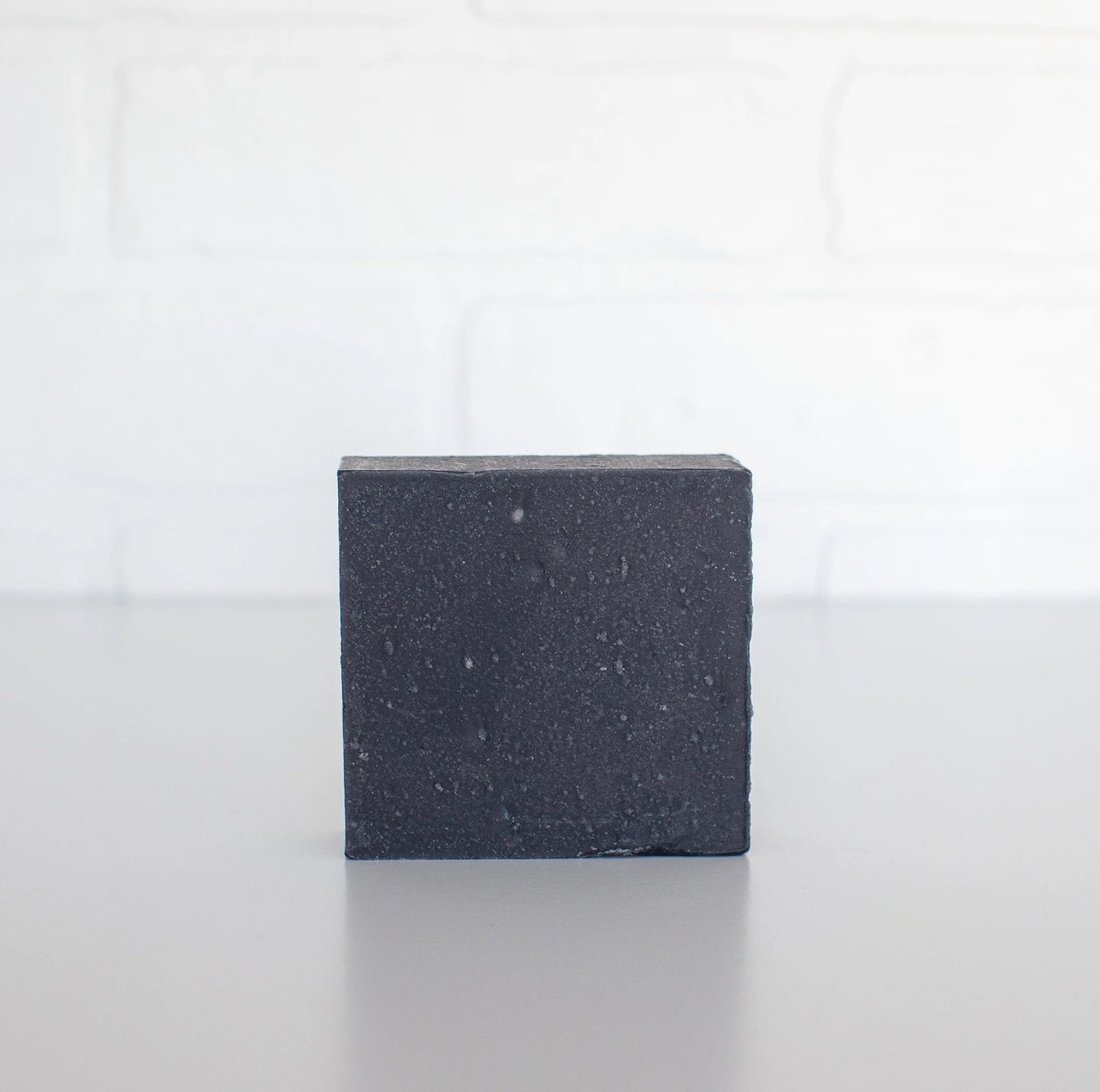 Black square block on a white background