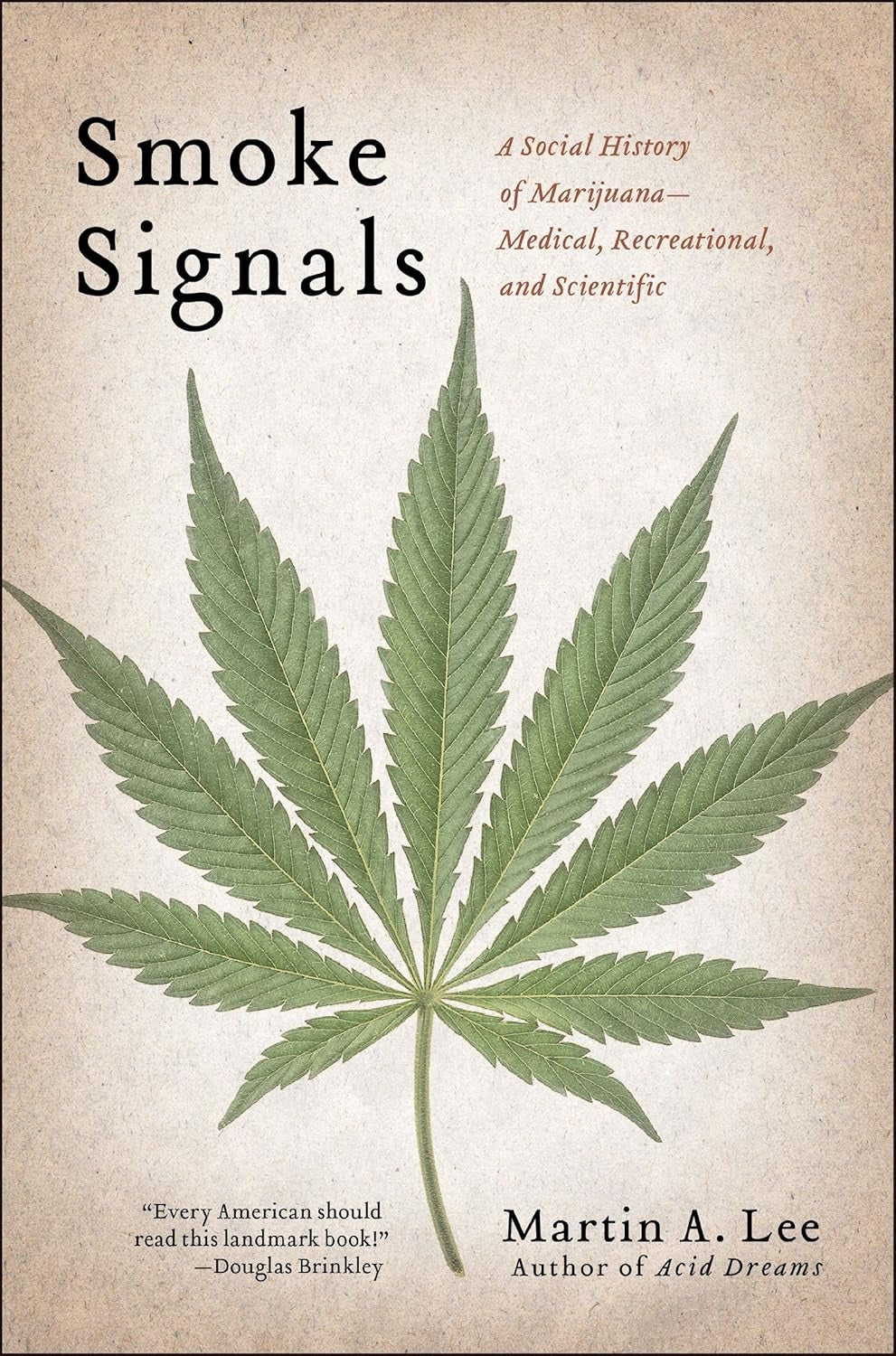 Book cover with marijuana leaf and tan background