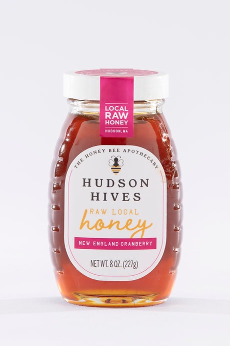 Jar of Hudson Hives honey on a white background