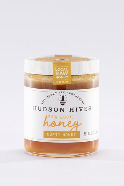 Jar of Hudson Hives honey on a white background