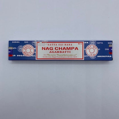 blue, white and red incense box on grey background