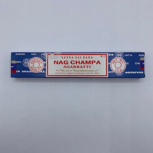 blue, white and red incense box on grey background