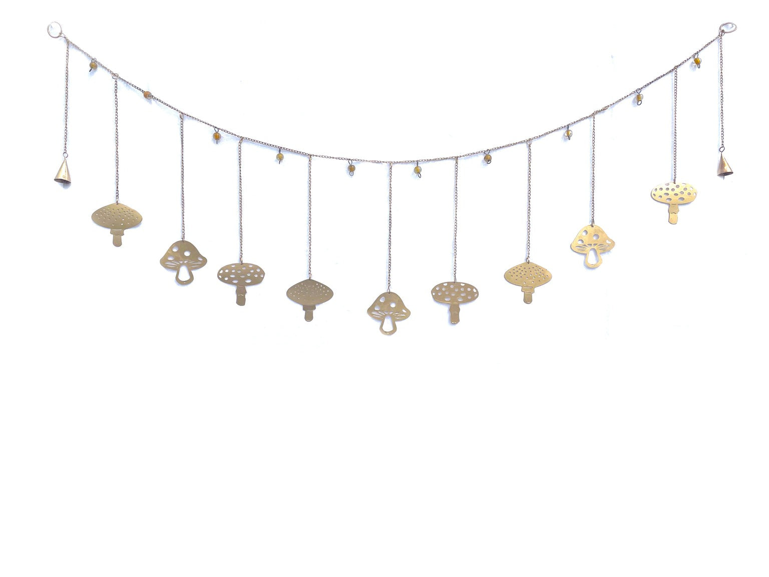 A decorative garland with gold mushrooms and gold beads