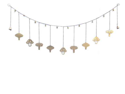 A decorative garland with gold mushrooms and gold beads