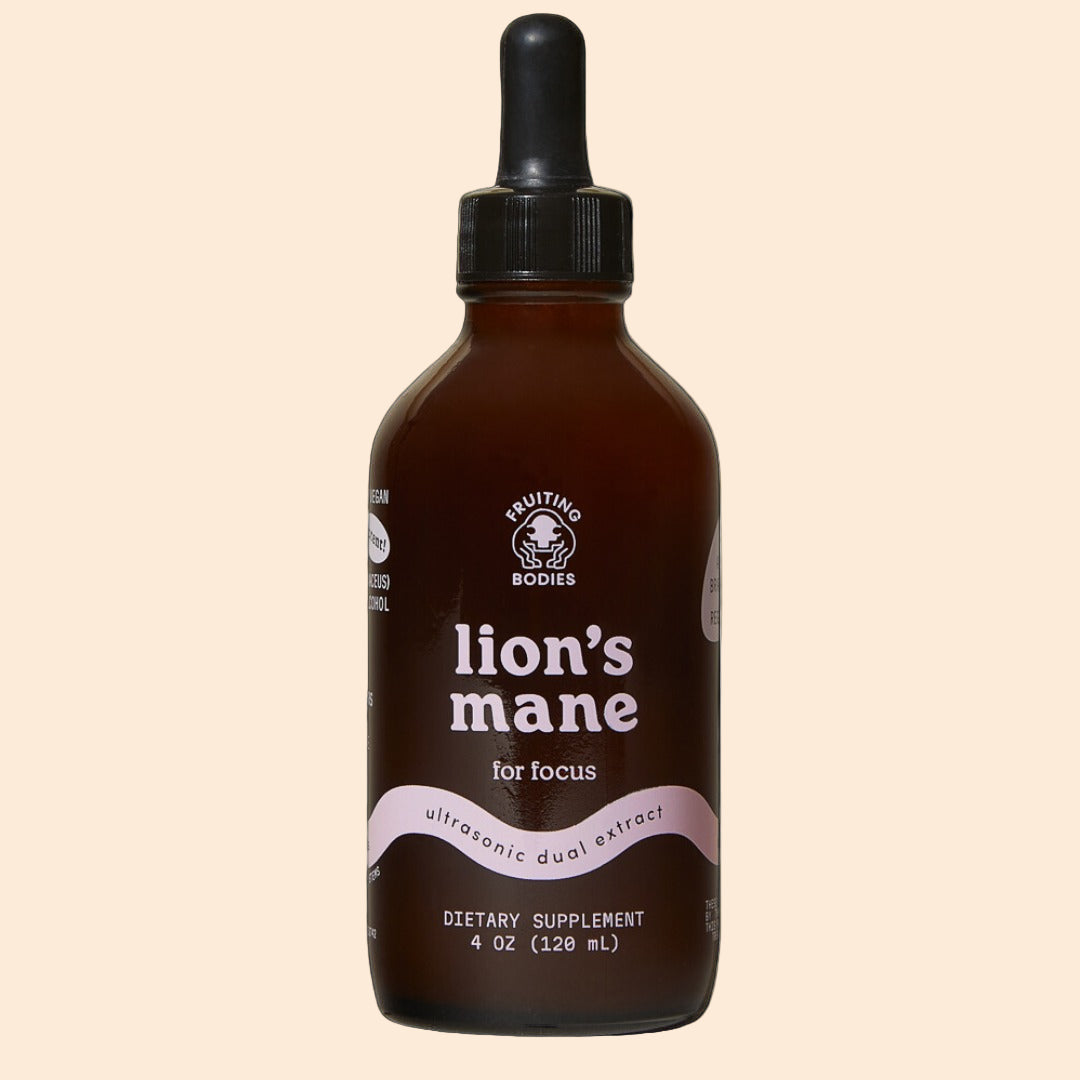 Bottle of 'lion's mane' dietary supplement with a black background