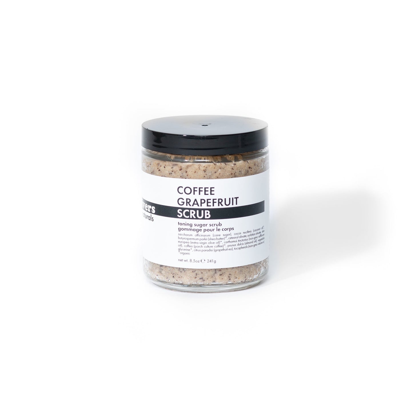 Jar of coffee grapefruit scrub with a black lid on a white background