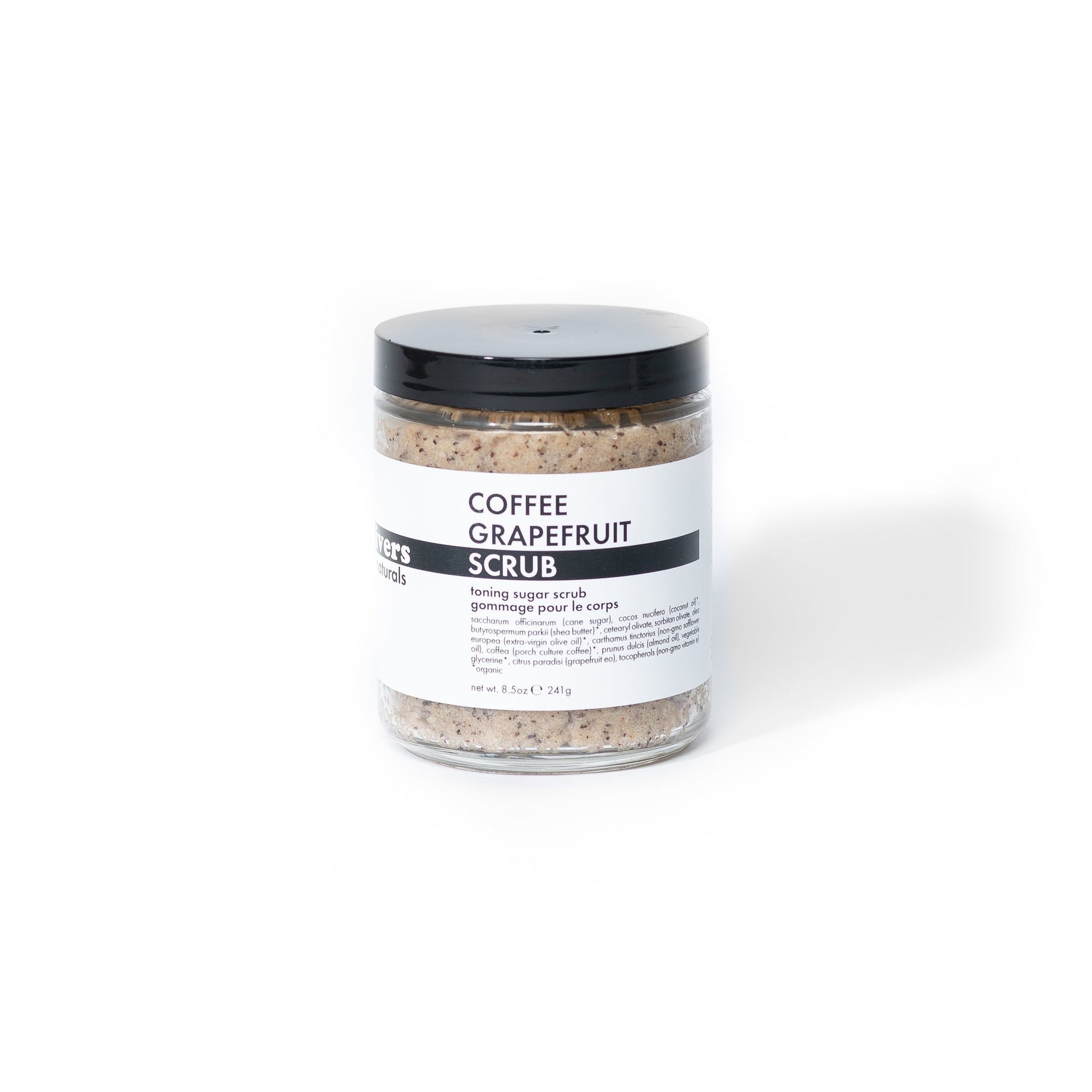 Jar of coffee grapefruit scrub with a black lid on a white background
