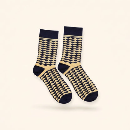 Pair of socks with geometric pattern on a white background