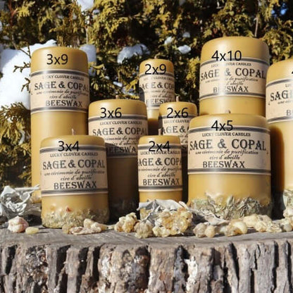 Stacks of Sage & Copal Beeswax containers on a wooden surface with natural background
