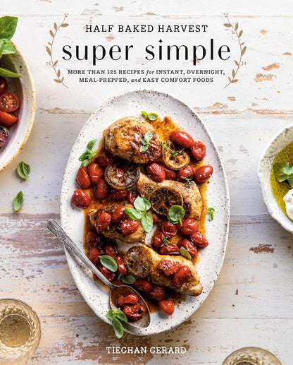 Book cover of 'Half Baked Harvest Super Simple' with a dish of roasted chicken and tomatoes on a wooden surface.