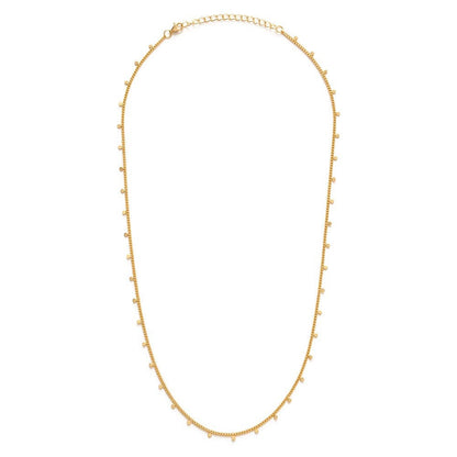 Gold necklace on a white background