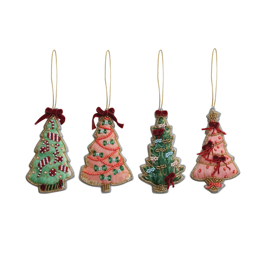 Four embroidered Christmas tree ornaments in pastel green, pink, and teal, each decorated with beadwork and ribbon bows, hanging from gold strings on a white background.
