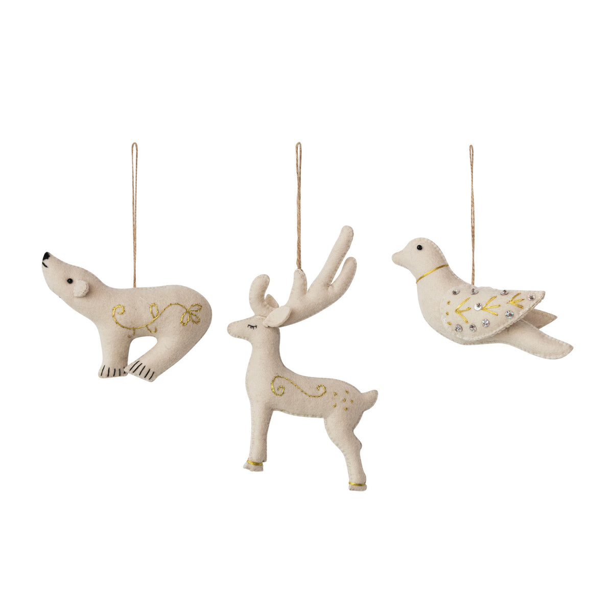 Three cream-colored felt Christmas ornaments shaped like a polar bear, a deer, and a dove, each decorated with gold and blue embroidered details and hanging from a thin string against a white background.